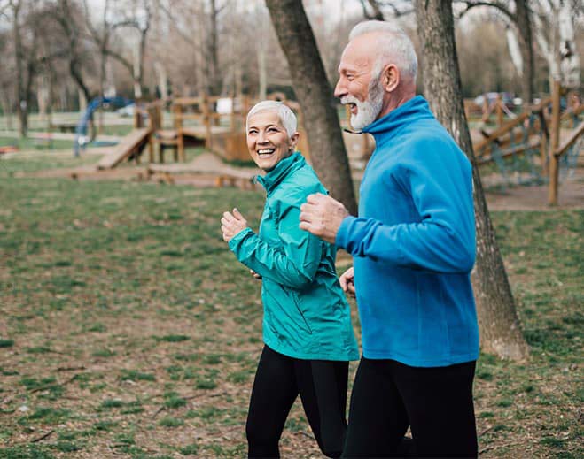 elderly couple jogging